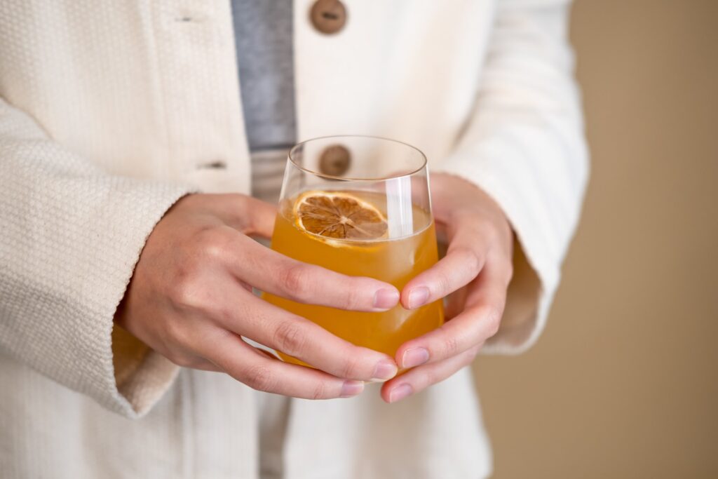 Person holding Kombucha