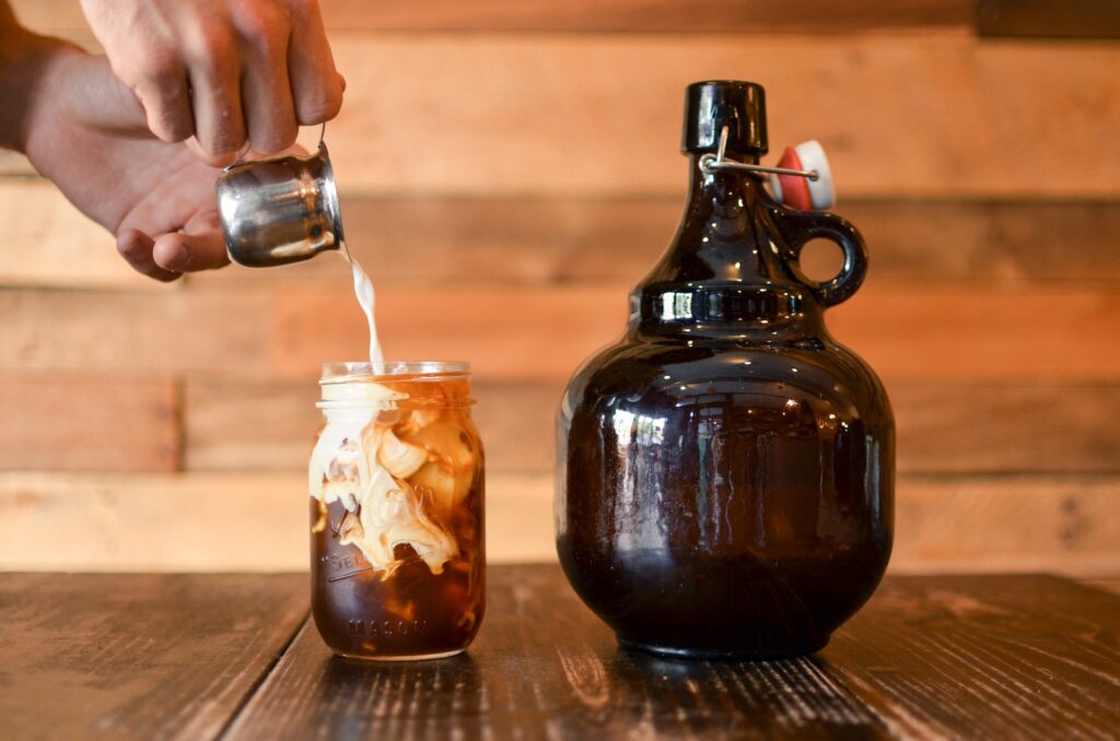 A growler of cold brew with cream.