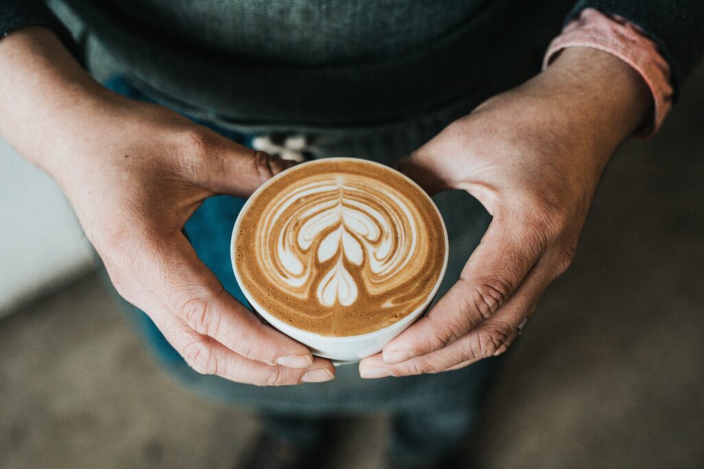 Man holding a latte