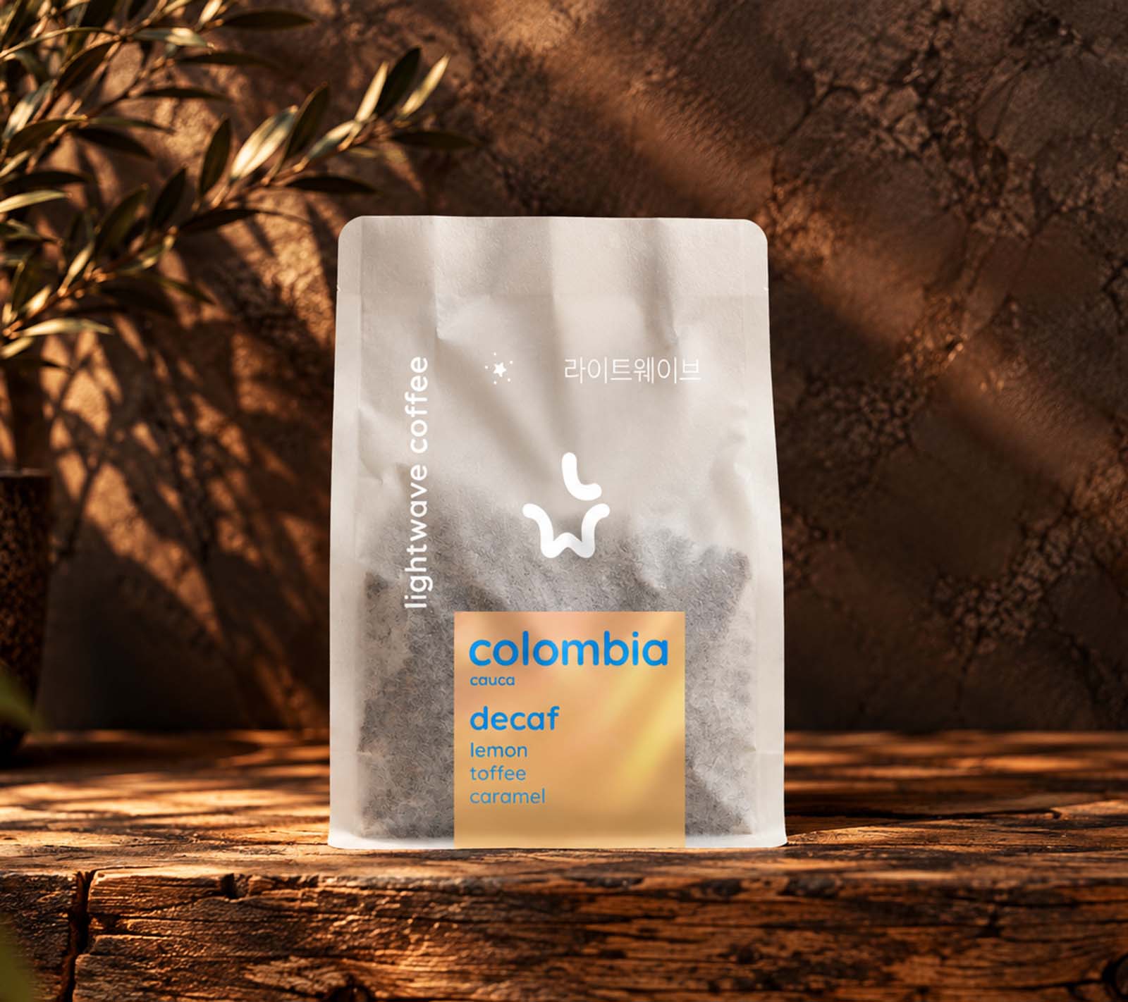 Lightwave Coffee Colombia Valle Del Cauca sugarcane EA decaf coffee bag on counter